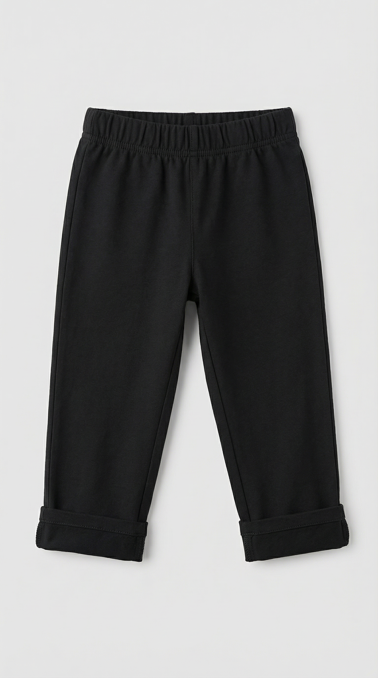 Black cotton pants with elastic waistband and rolled cuffs, size 2T