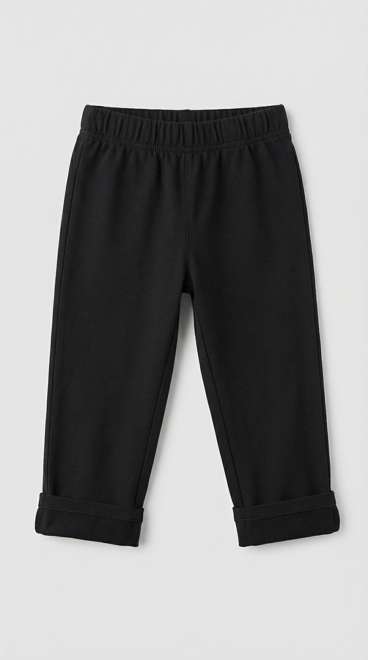 Black cotton pants with elastic waistband and rolled cuffs, size 2T